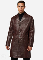 Man wearing a brown leather trench coat on a white background