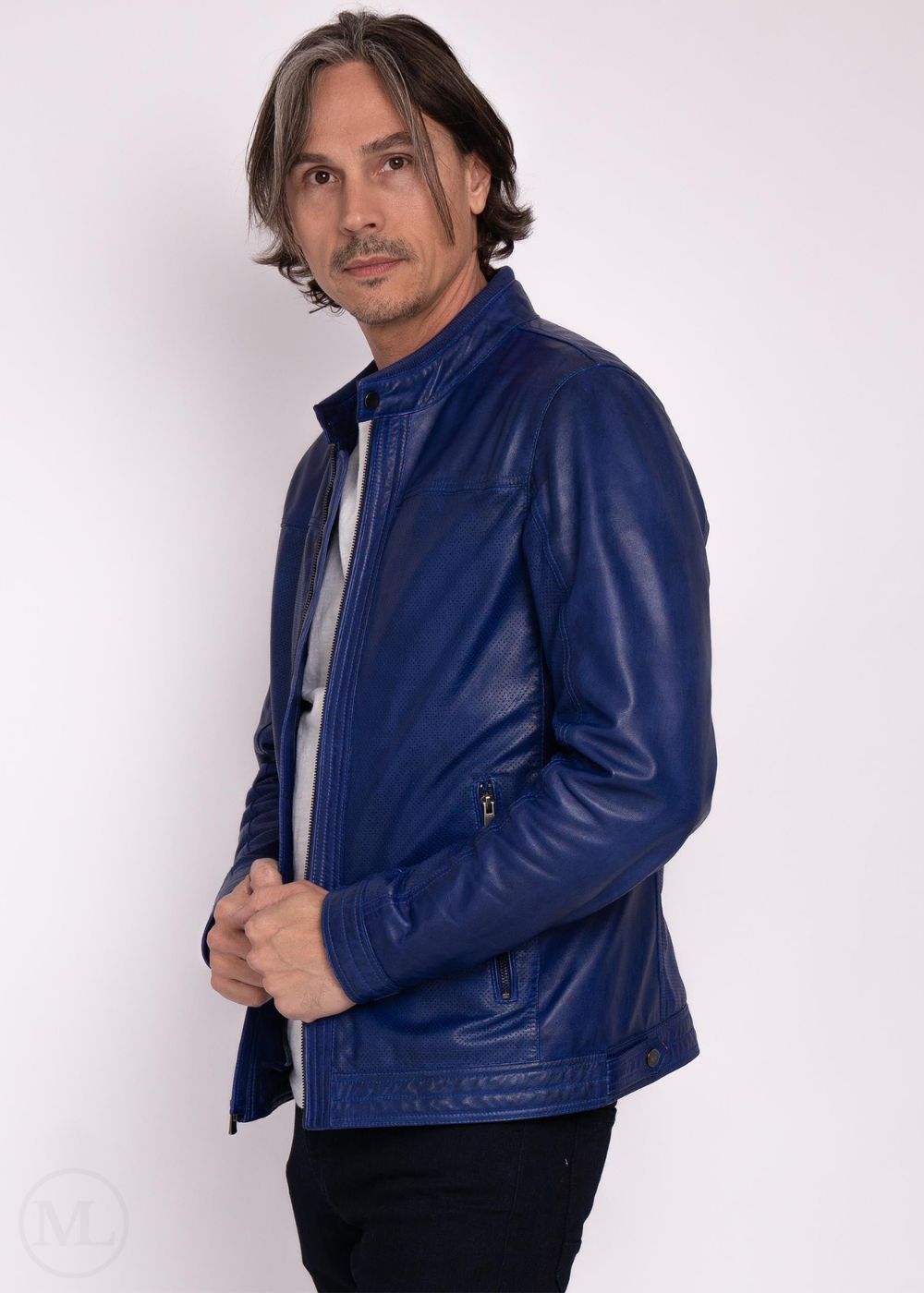Man wearing a navy leather jacket on a white background