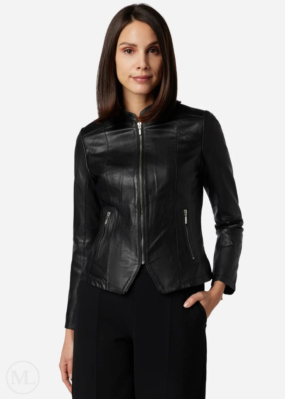 Woman wearing a black leather jacket on a white background