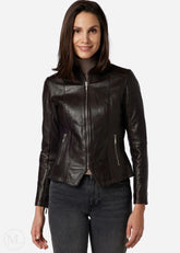Woman wearing a brown leather jacket on a white background