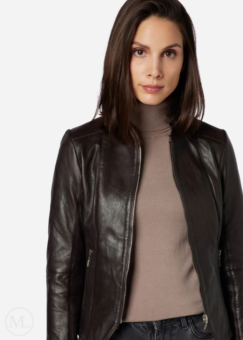 Woman wearing a brown leather jacket on a white background