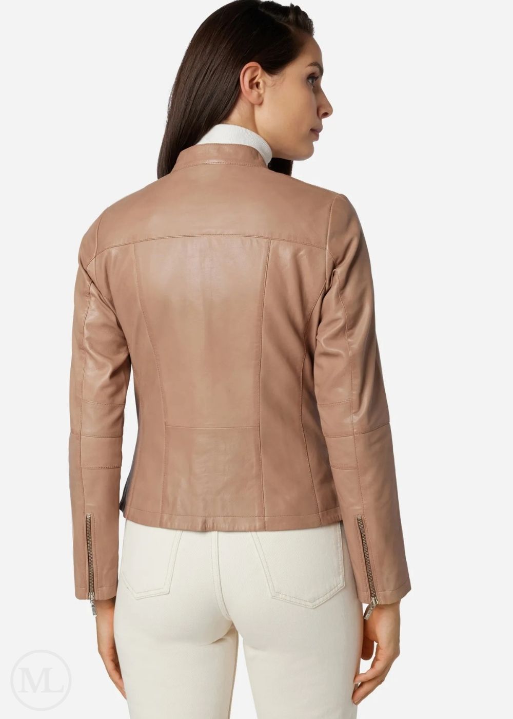 Woman wearing a taupe leather jacket on a white background