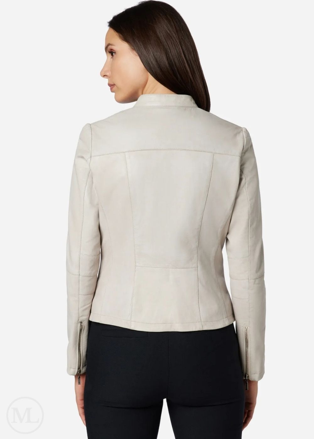 Woman wearing a white leather jacket on a white background