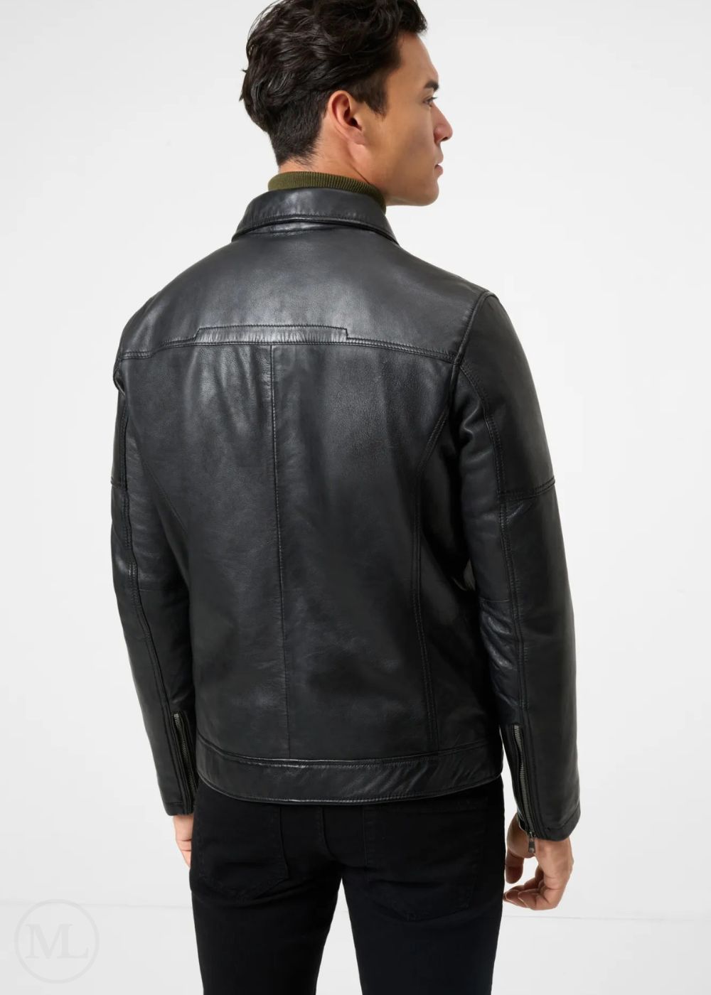 Man wearing a black leather racer jacket on a white background