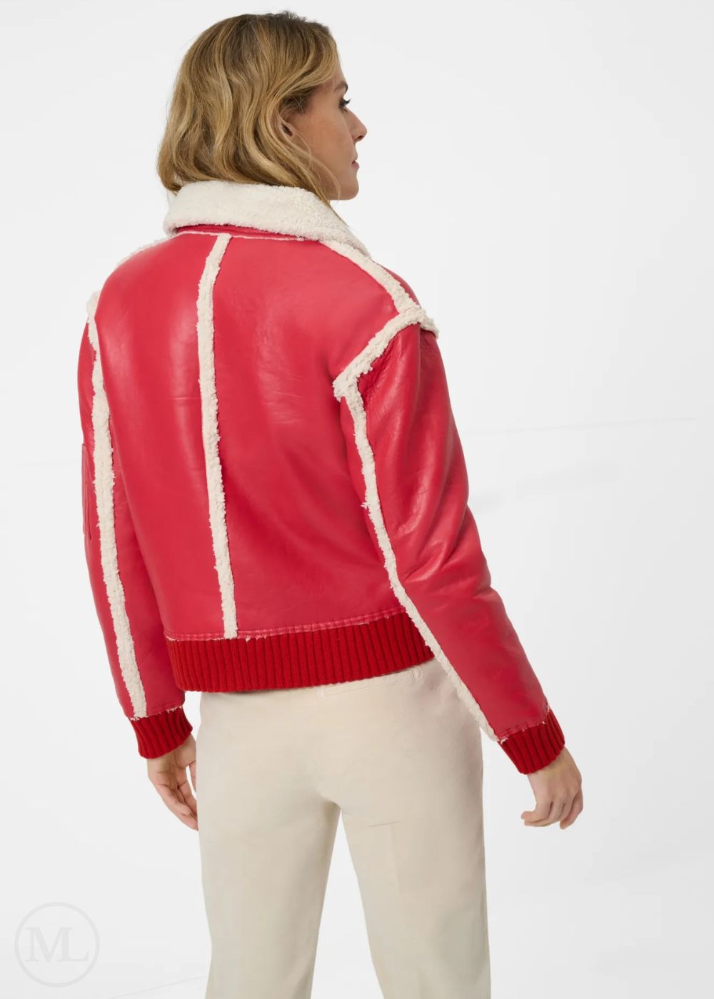 Women wearing a red leather aviator jacket with white trim on a white background
