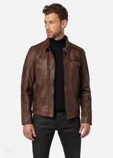 Man wearing a brown leather jacket on a white background