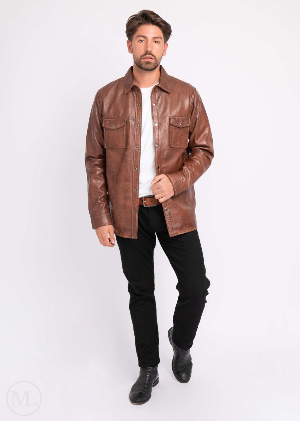 Man wearing a cognac brown leather shirt over a white t-shirt on a white background