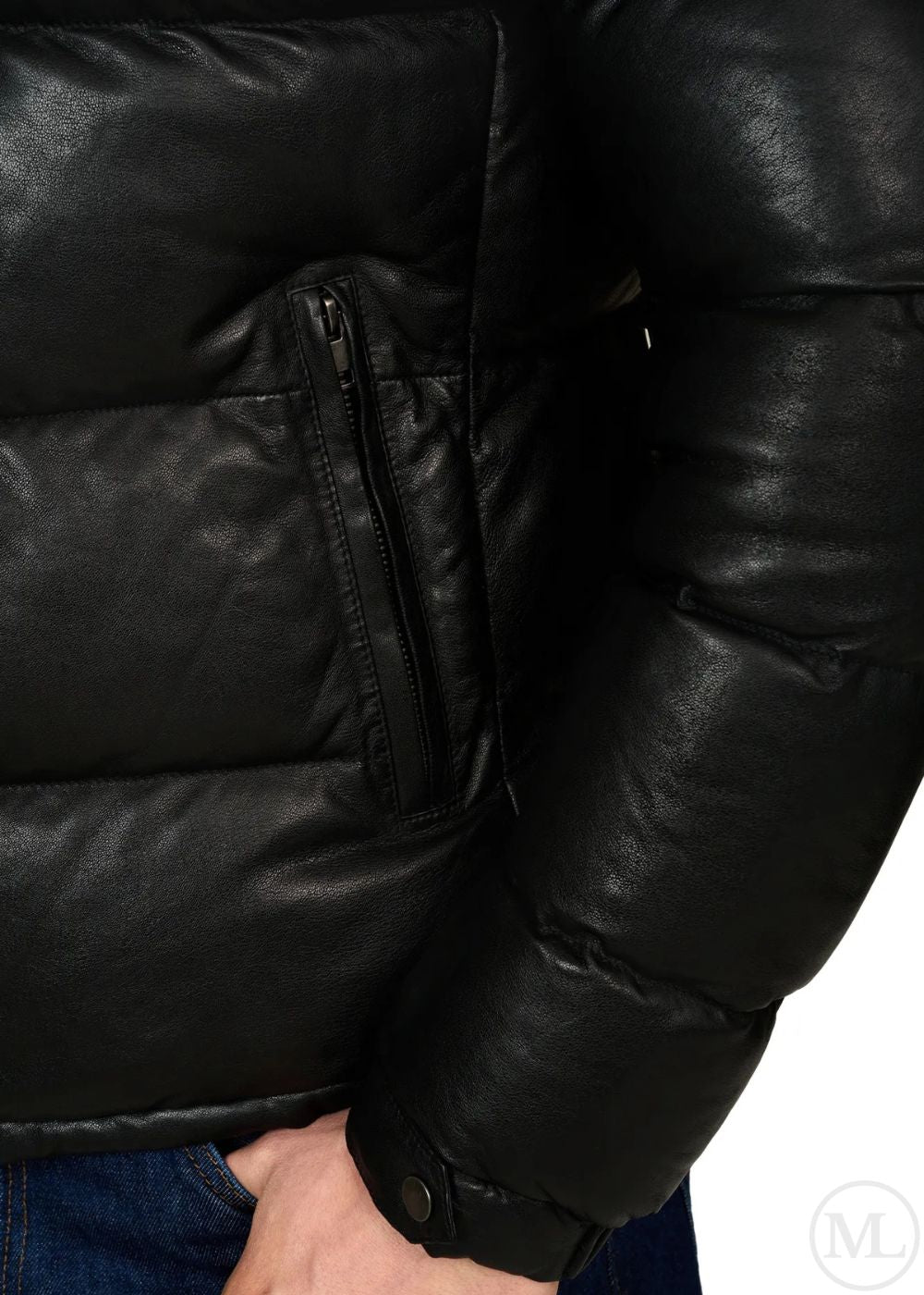 Close-up of a black leather puffer jacket with a zipper on a white background