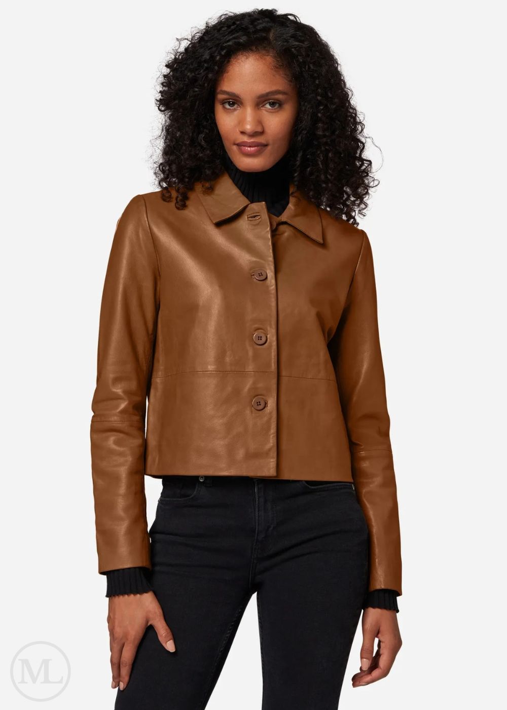 Woman wearing a brown leather cropped jacket on a white background