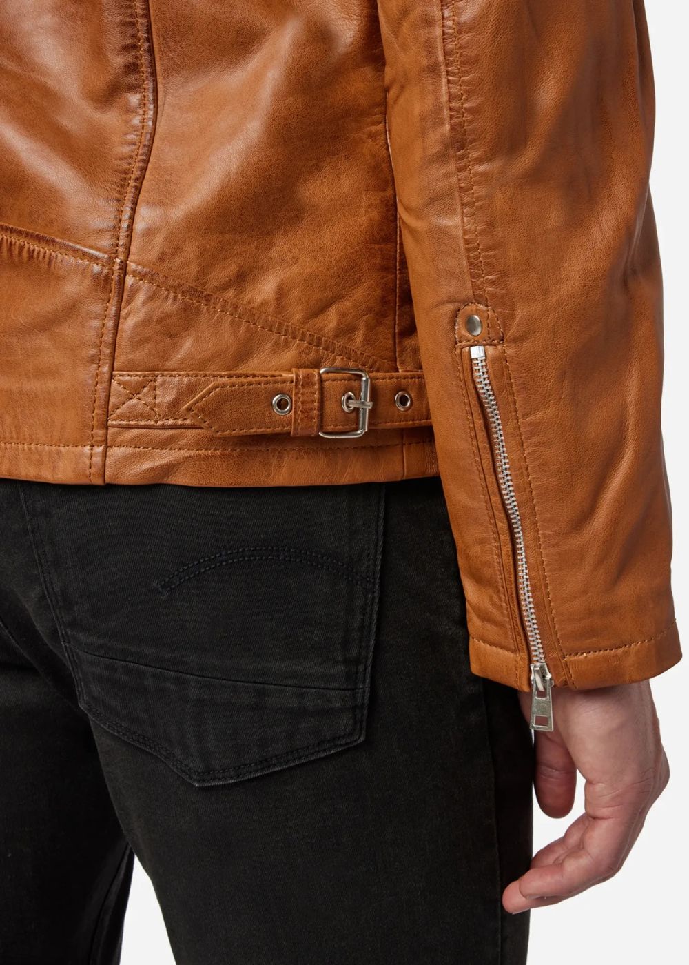 Close-up of a cognac brown leather jacket with a zipper on a white background