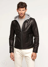 Man wearing a black lambskin leather jacket with a hood on a white background