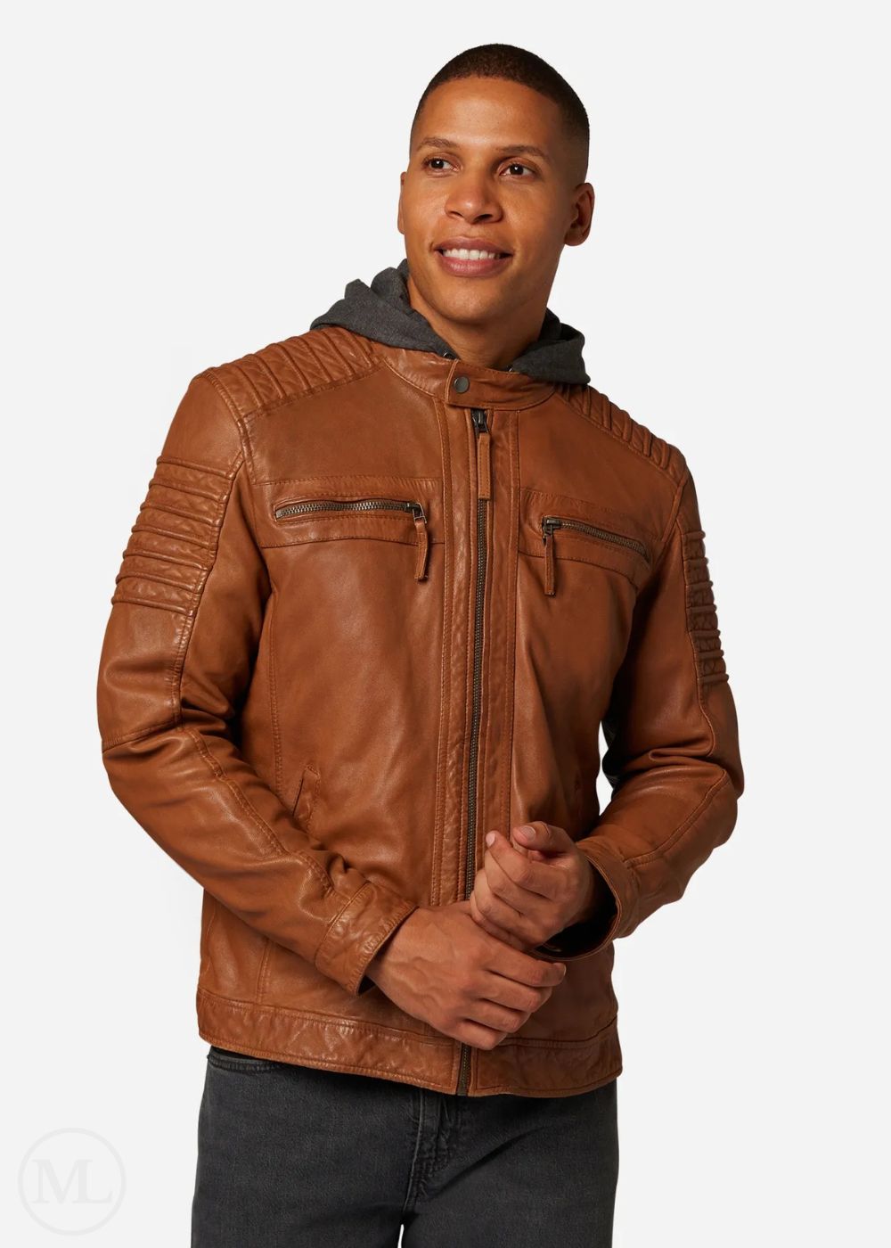 Man wearing a cognac brown leather jacket with a gray hood on a white background