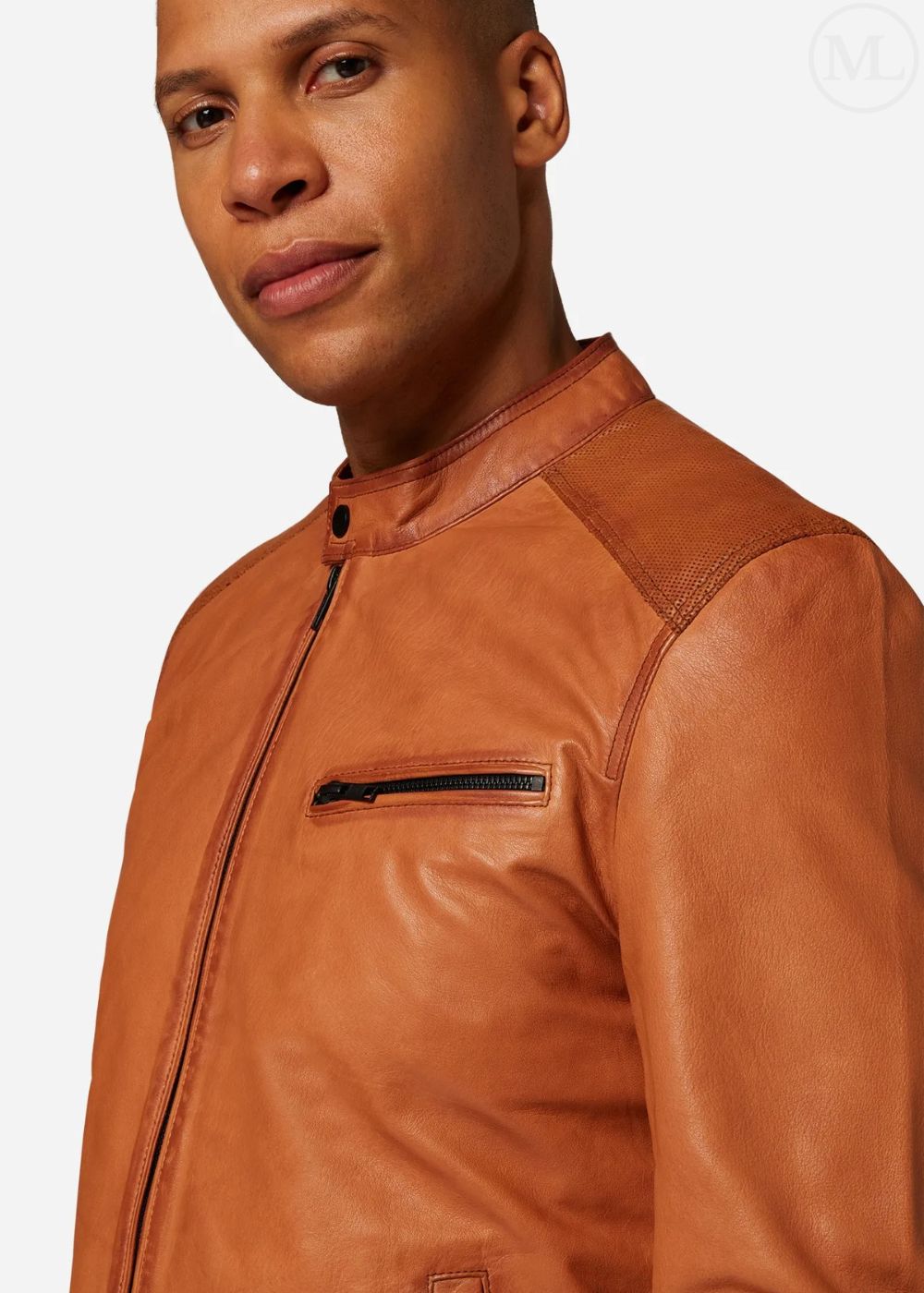Man wearing a cognac brown leather jacket on a white background