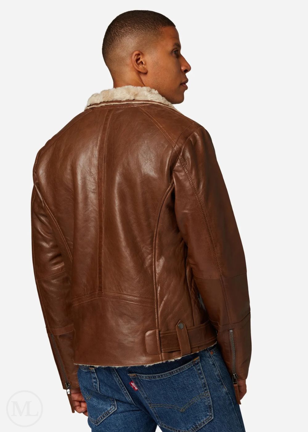 Man wearing a cognac brown leather jacket with fur collar on a white background