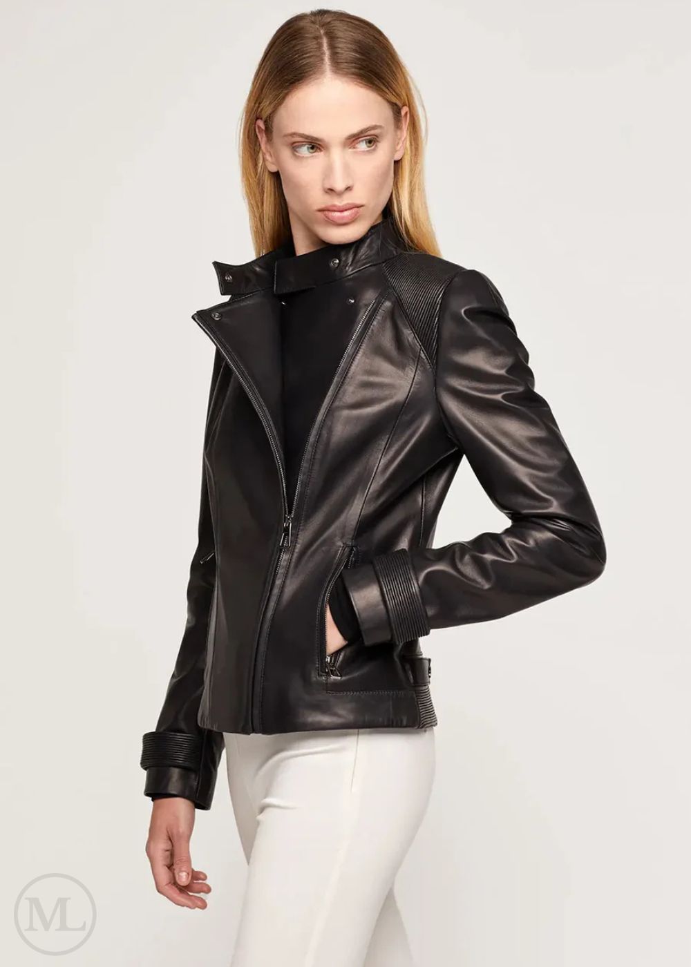 Woman wearing a black leather biker jacket on a white background