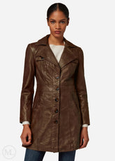 Woman wearing a dark brown leather coat on a white background