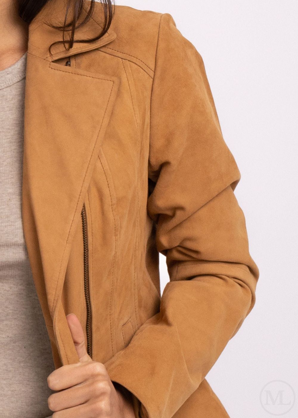 Close-up of a camel leather jacket on a white background