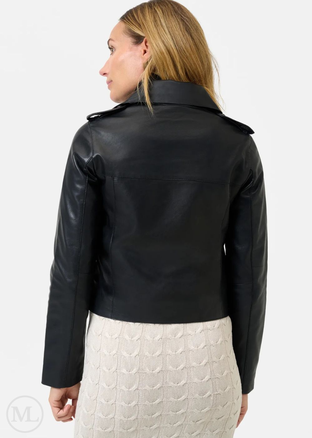 Woman wearing a black leather jacket on a white background