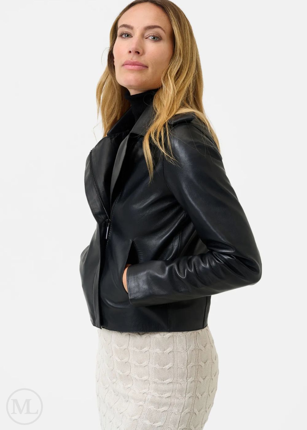 Woman wearing a black leather jacket on a white background