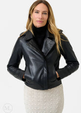 Woman wearing a black leather jacket on a white background