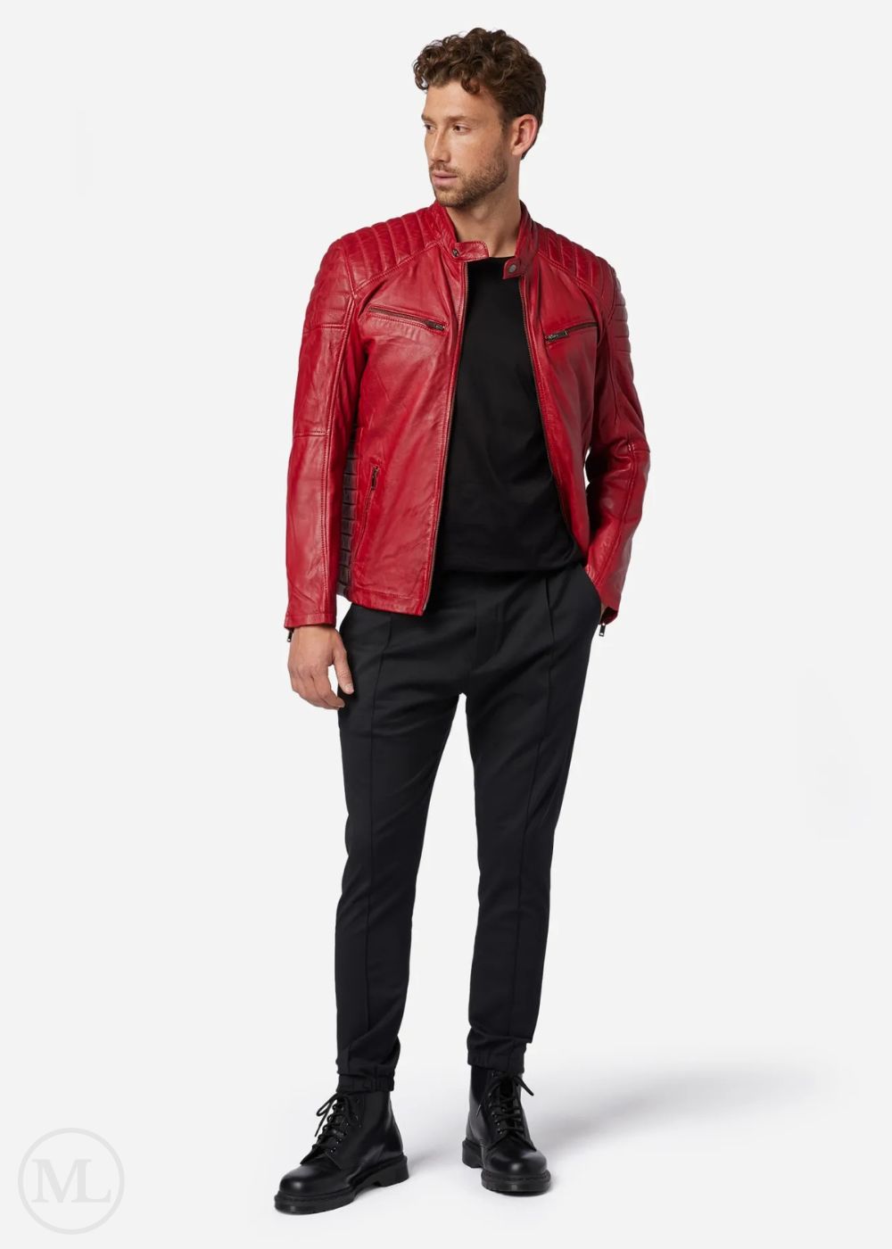 Man wearing a red leather biker jacket, black shirt, and pants on a white background