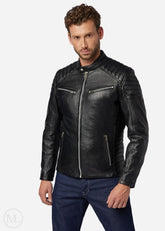 Man wearing a black leather biker jacket on a white background