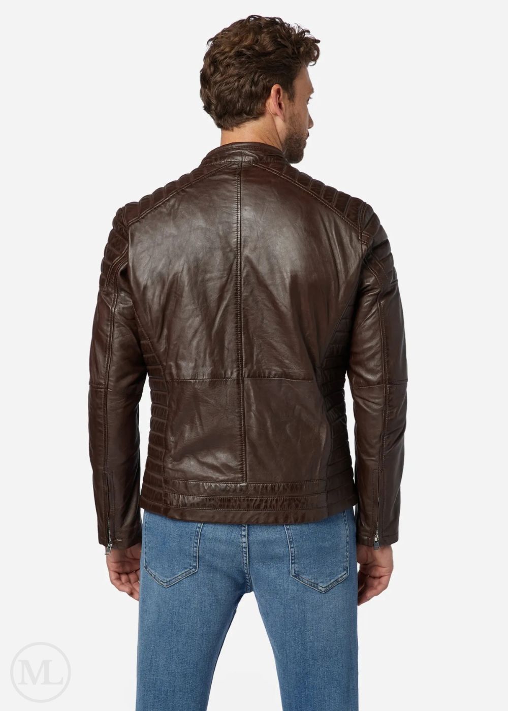 Man wearing a brown leather biker jacket and blue jeans on a white background