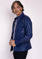 Man wearing a navy leather jacket on a white background