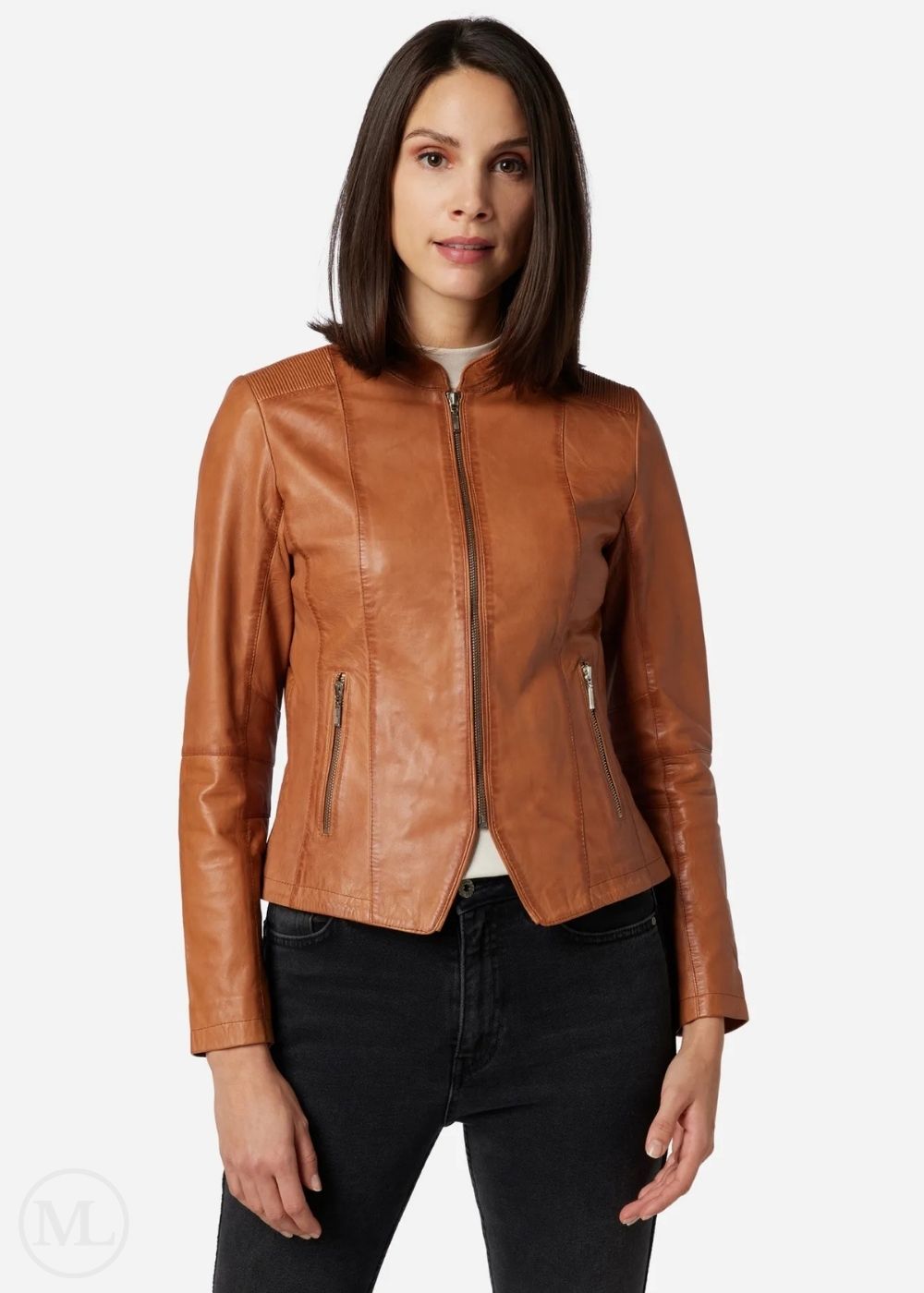 Woman wearing a cognac brown leather jacket on a white background