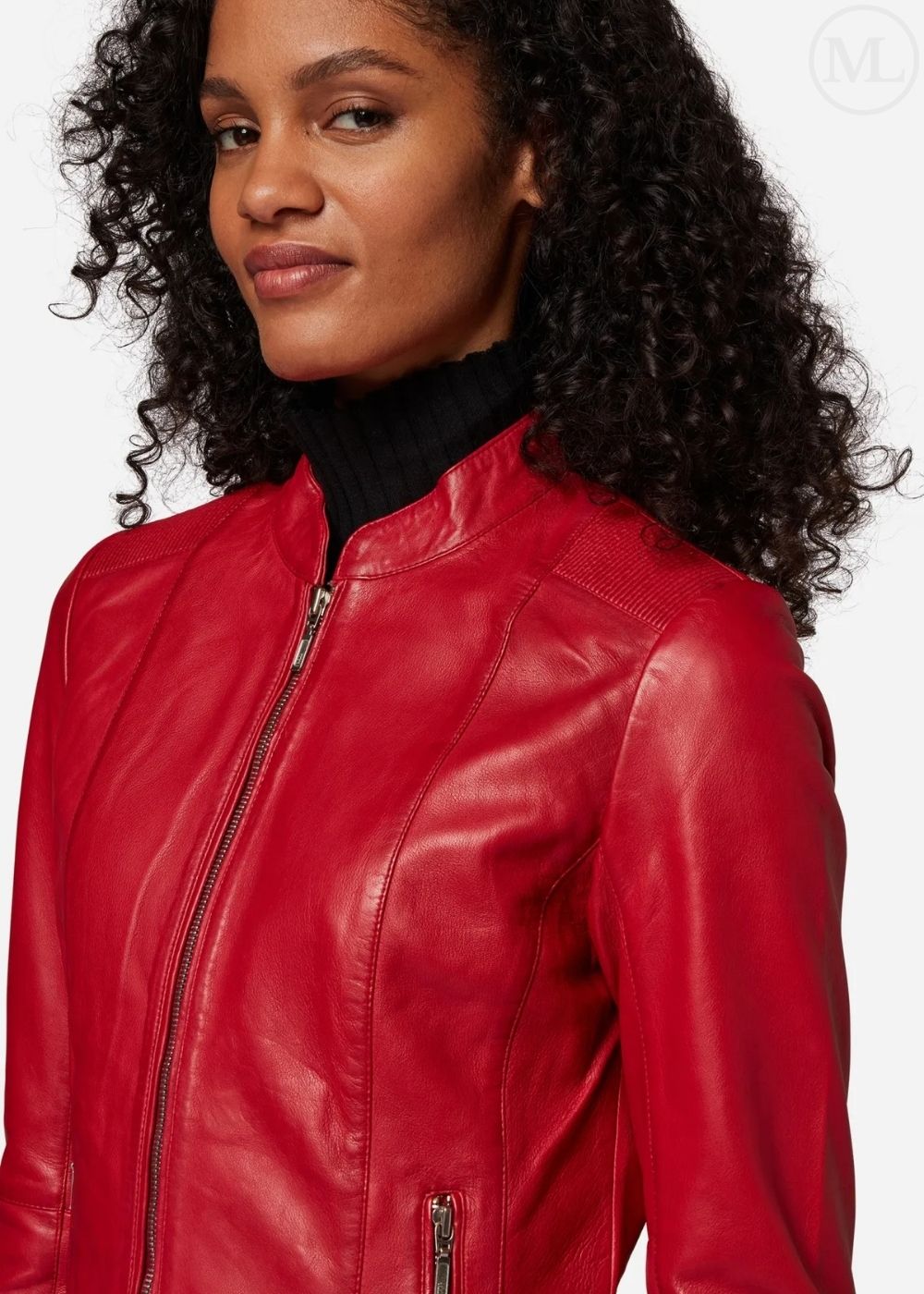 Woman wearing a red leather jacket on a white background