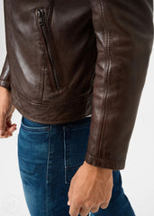 Dark Brown leather racer jacket worn by a person on a white background