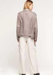 woman wearing a gray Oversized Nubuck Leather Biker Jacket with Belted Waist and white pinstripe pants on a white background