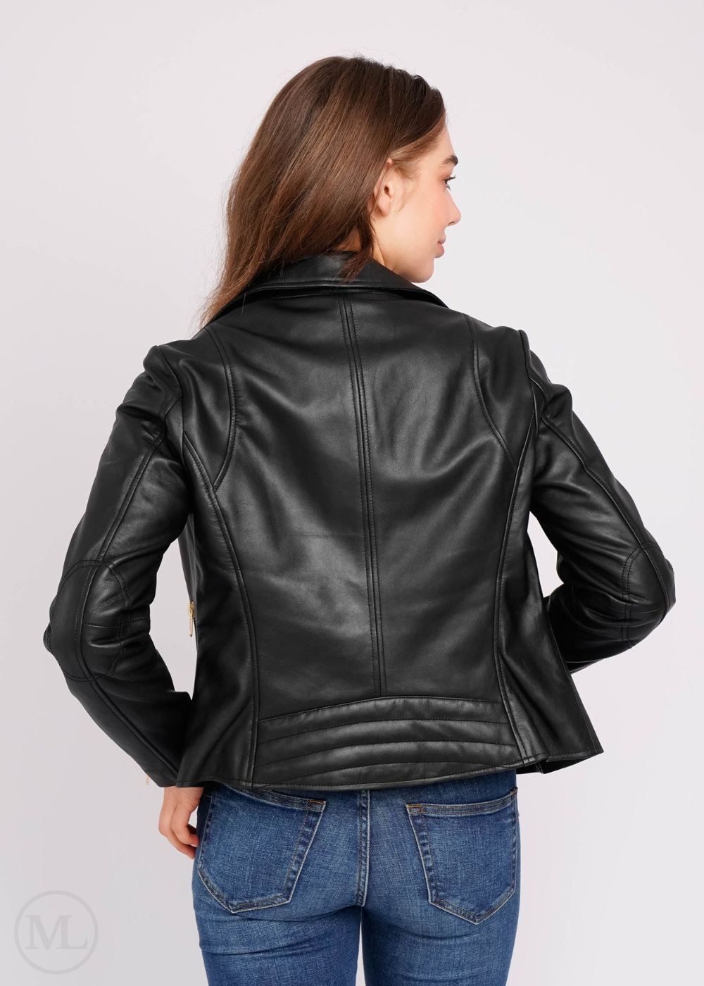 Women wearing a black leather biker jacket on a white background