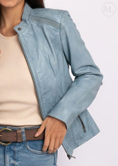 Ice Blue leather biker jacket worn by a women on a white background
