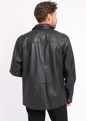 Man wearing a black leather jacket on a white background