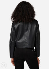 Women wearing a black leather jacket on a white background