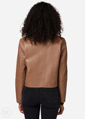 Women wearing a camel leather cropped jacket on a white background