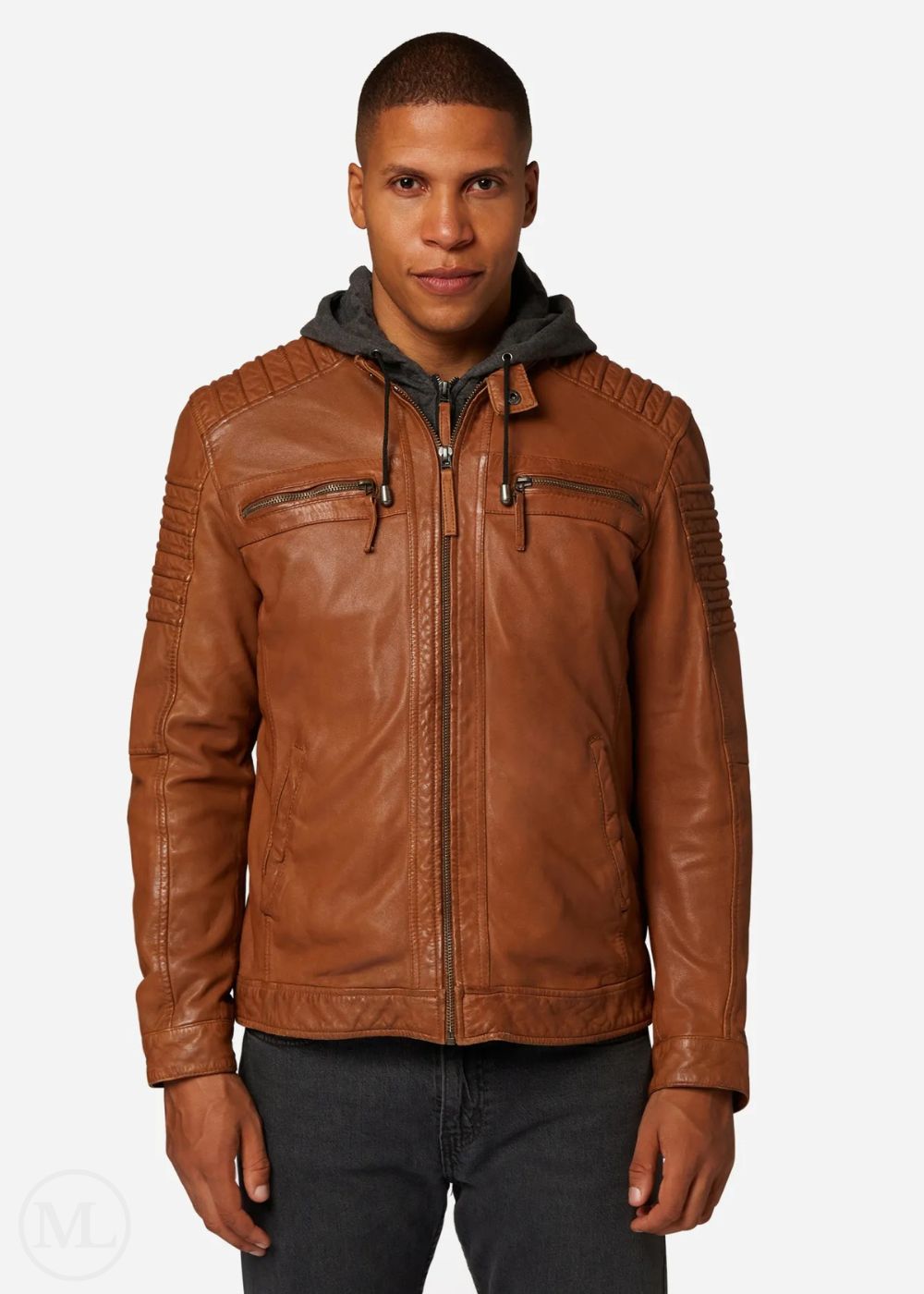 Man wearing a cognac brown leather jacket with a gray hoodie on a white background