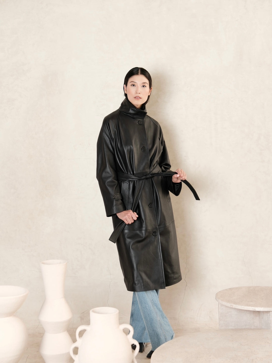 files/Luna_Women_s_Black_Belted_Lambskin_Leather_Trench_Coat_women_holding_the_belt.jpg