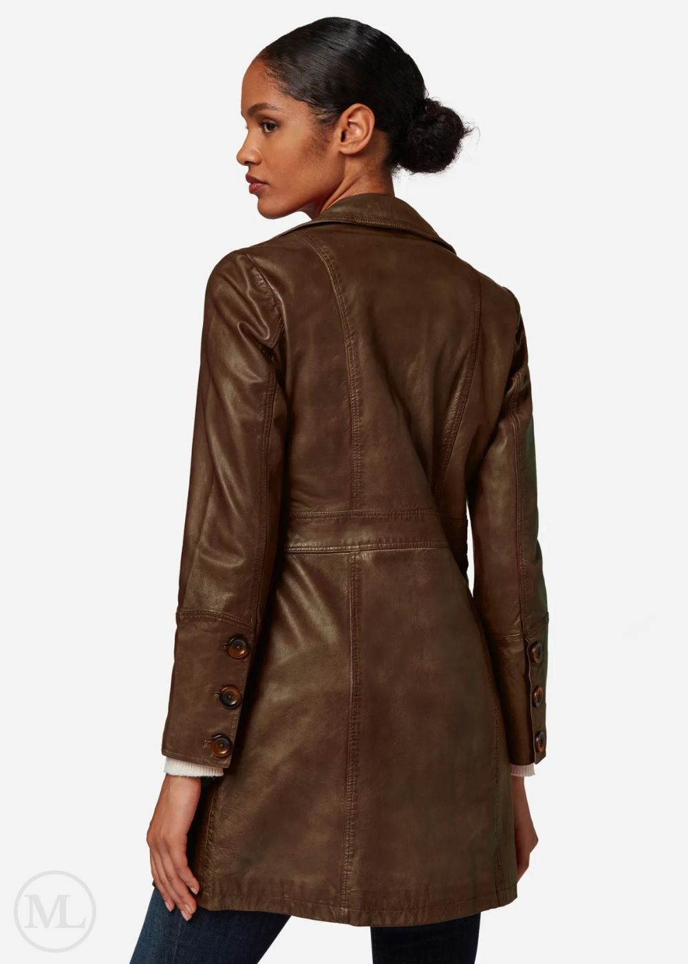 Woman wearing a brown leather coat on a white background