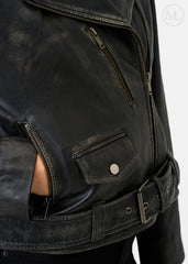 Close-up of a black leather biker jacket with zippers and a belt on a white background