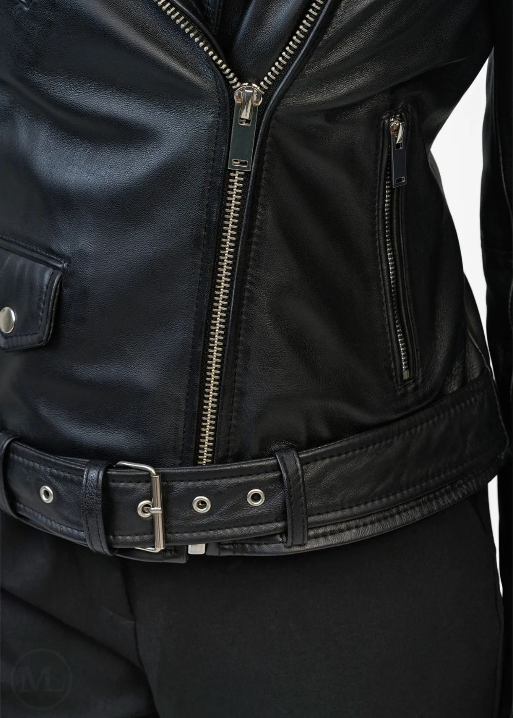 Close-up of a black leather biker jacket with a zipper and belt.